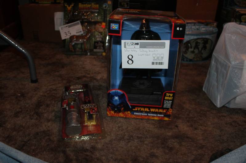 lot 8 image: Star Wars Darth Vader Talking Bank & Darth Maul Light Saber