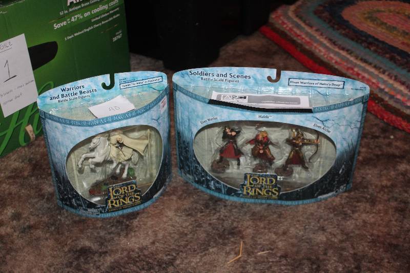 lot 40 image: Lot of (2) Lord of the Rings Warriors and Battle Beasts Action Figures - Gandalf The White on Shadowfax, Elven Warriors of Helms Deep