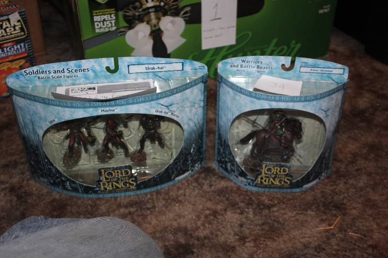 lot 39 image: Lot of (2) Lord of the Rings Warriors and Battle Beasts Action Figures - Uruk-hai, Rohan Horseman