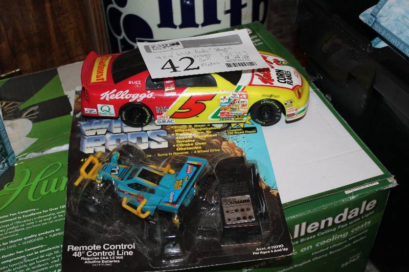 lot 42 image: Lot of (2) Car Action Figurines - 4x4 Wild Rods Buggie, Kelloggs Corn Flakes NASCAR