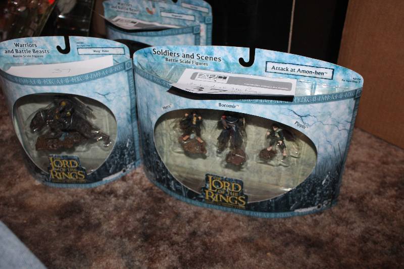 lot 37 image: Lot of (2) Lord of the Rings Warriors and Battle Beasts Action Figures - Warg Rider, Attack at Amon-hen
