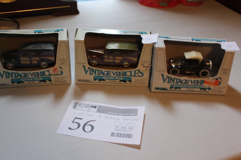 lot 56 image: Lot of (3) Vintage Vehicle Scale Die-cast Model Cars - 1940 Ford Woody, 1914 Chevrolet Royal Mail Roadster