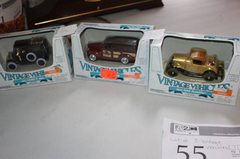 lot 55 image: Lot of (3) Vintage Vehicle Scale Die-cast Model Cars - 1932 Ford Roadster, 1940 Ford Woody, 1913 Model T Van