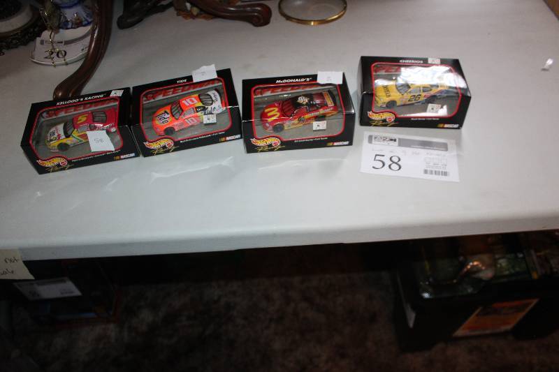 lot 58 image: Lot of (4) Hot Wheels NASCAR Die-cast Model Cars - #5, #10, #94, #26