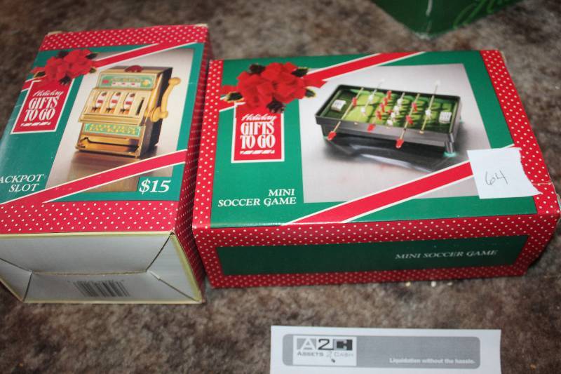 lot 64 image: Lot of (2) Christmas Gifts - Jackpot Slots, Mini Soccer Game