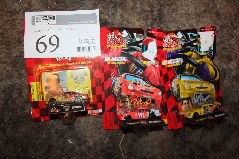 lot 69 image: Lot of (3) Racing Champions NASCAR 164 Scale Die-cast Cars - #5 Kelloggs, #10 Tide, #26 Cheerios