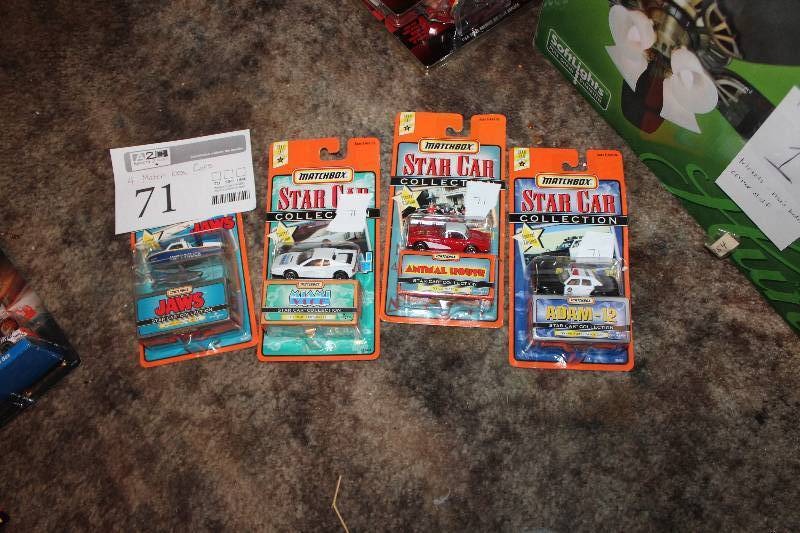 lot 71 image: Lot of (4) Matchbox 164 Scale Die-cast Cars - JAWS, Miami Vice, Animal House, Adam-12