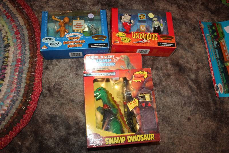 lot 73 image: Lot of (3) Action Figures -  Underdog, Rocky & Bulwinkle, Swamp Dinosaur
