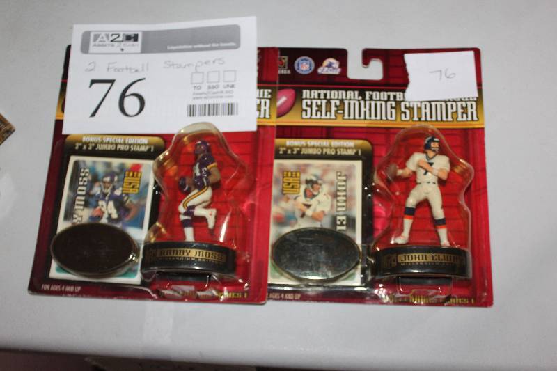 lot 76 image: Lot of (2) Football Stampers - Randy Moss, John Elway