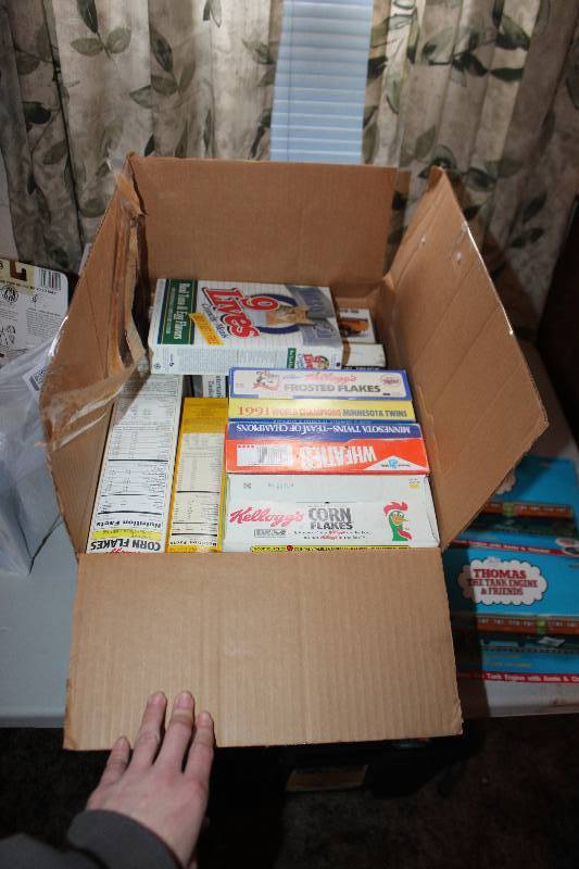 lot 79 image: Box Lot of (11) Empty Boxes - Wheaties, Cheerioes, Corn Flakes, 9Lives, Plastic Model Cars