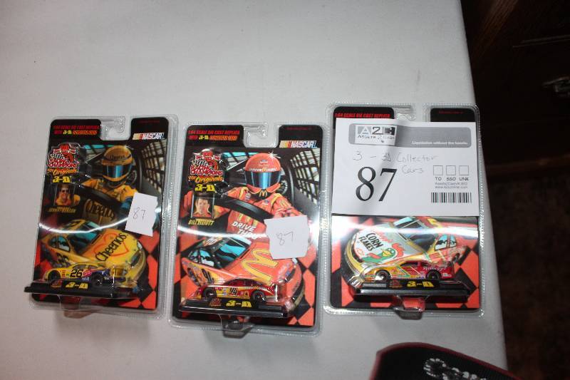 lot 87 image: Lot of (3) NASCAR 3D Collector Cars - #26 Cheerioes, #94 McDonalds, #5 Corn Flakes