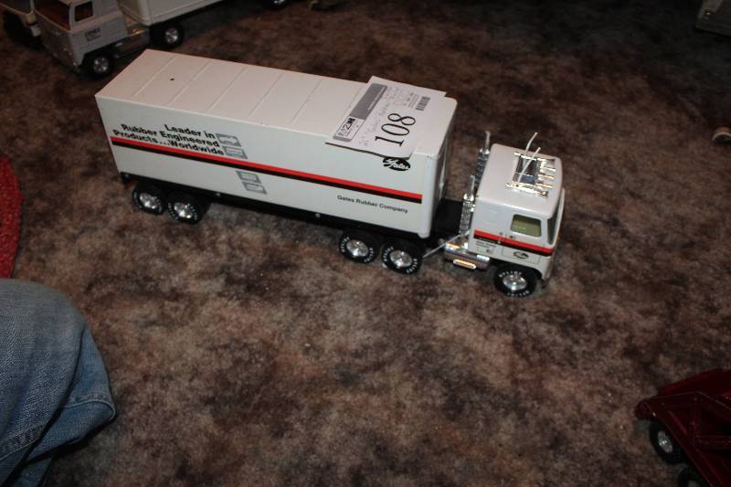 lot 108 image: Gates Rubber 21in. Semi Tractor Trailer Set