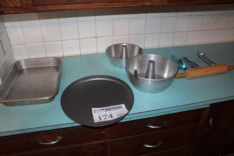 lot 174 image: Bakeware - Cake Pans, Cookie Sheet, Rolling Pin, Scoops, Pizza Cutter, Multi-Tool
