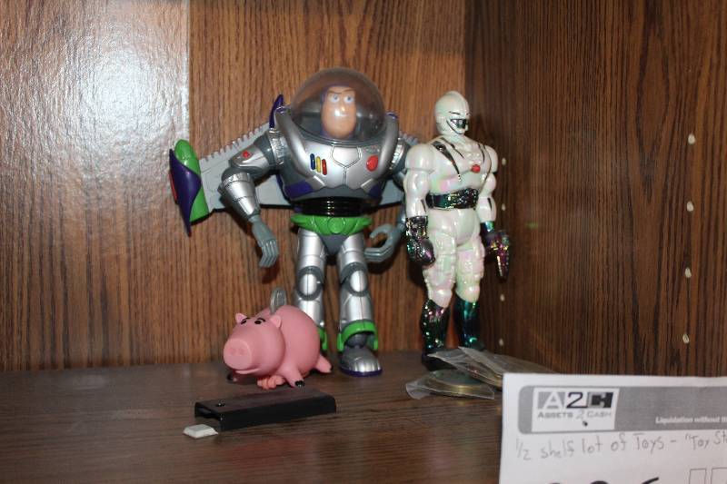 lot 336 image: 12-Shelf Lot of Toys - Buzz Lightyear, And More