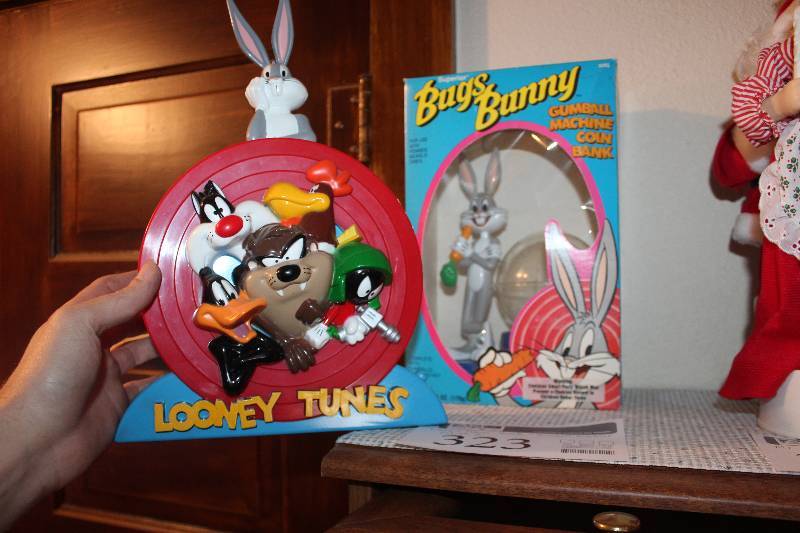 lot 323 image: Lot of (2) Looney Tunes Bank, Bugs Bunny Gumball Machine