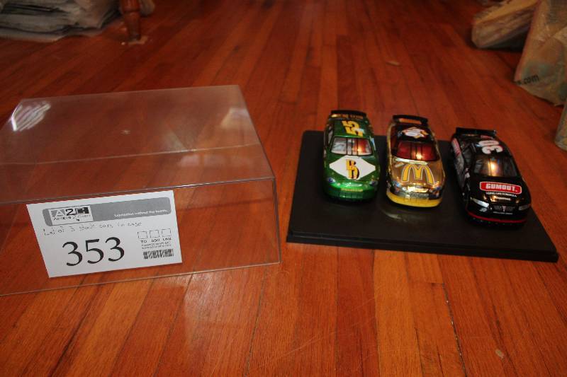 lot 353 image: Lot of (3) 118 NASCAR Cars in Display Case