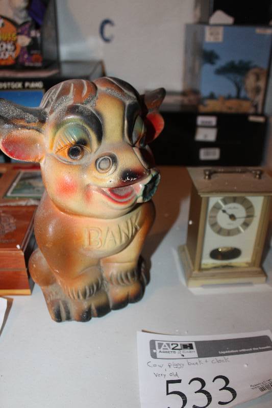 lot 533 image: Vintage Cow Piggy Bank, Table Clock