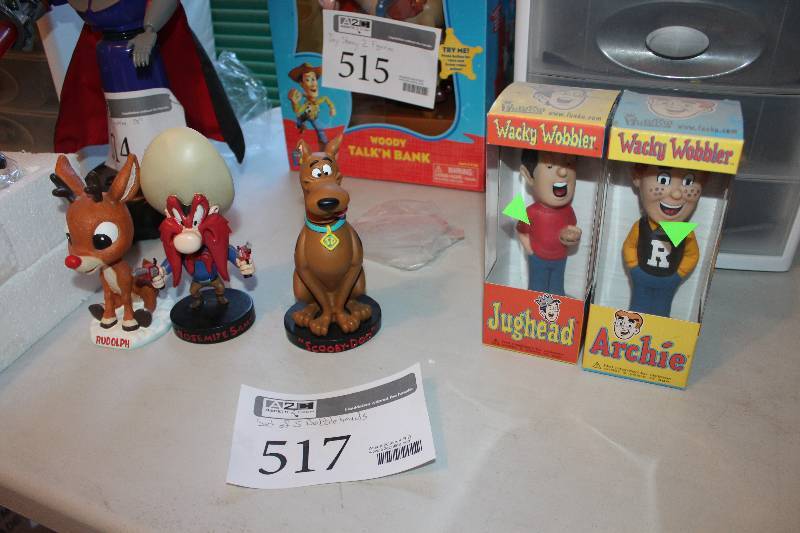 lot 517 image: Lot of (5) Bobble-heads - Archie, Jughead, Scooby-doo, Yosemite Sam, Rudolph The Red Nosed Reindeer
