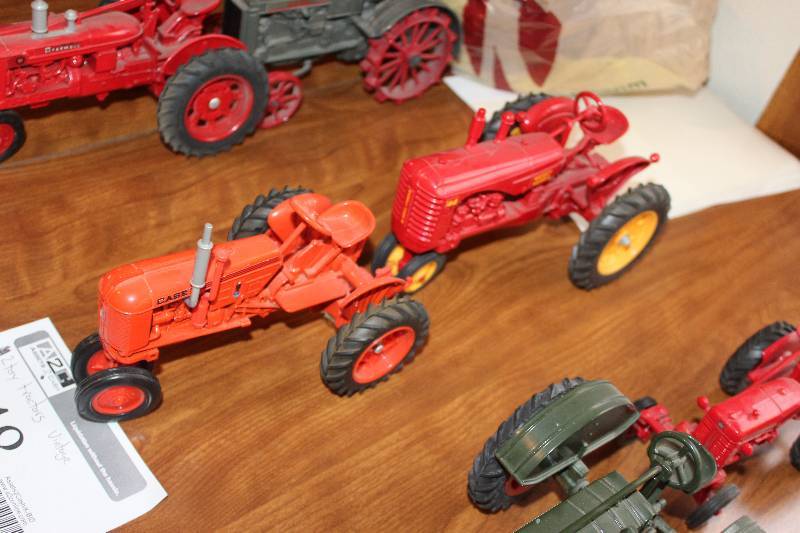 lot 448 image: Lot of (2) Vintage Toy Tractors - Massey Harris 44, Case