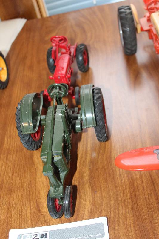 lot 449 image: Lot of (2) Vintage Toy Tractors - Massey Harris Challenger, Farmall