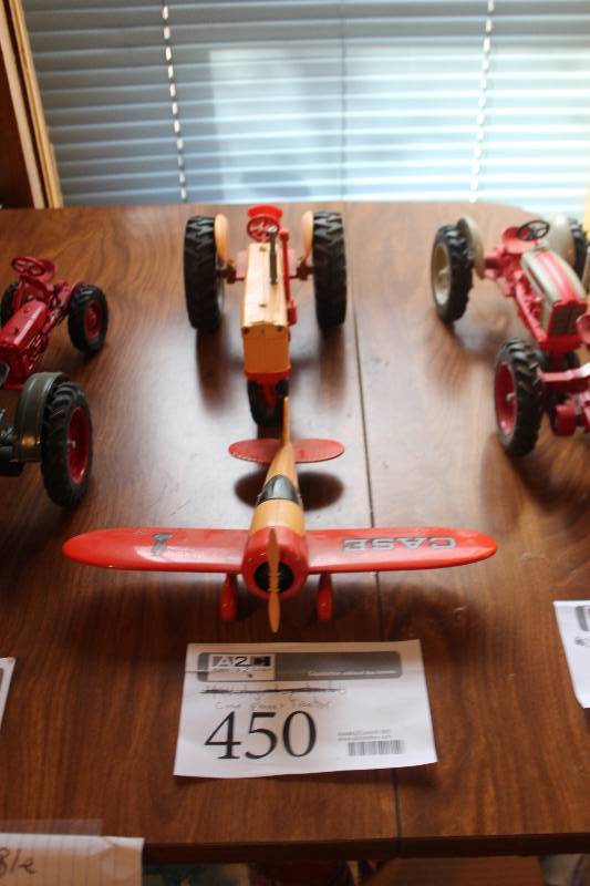 lot 450 image: Case Toys - Airplane, Case 800 Case-o-matic Tractor