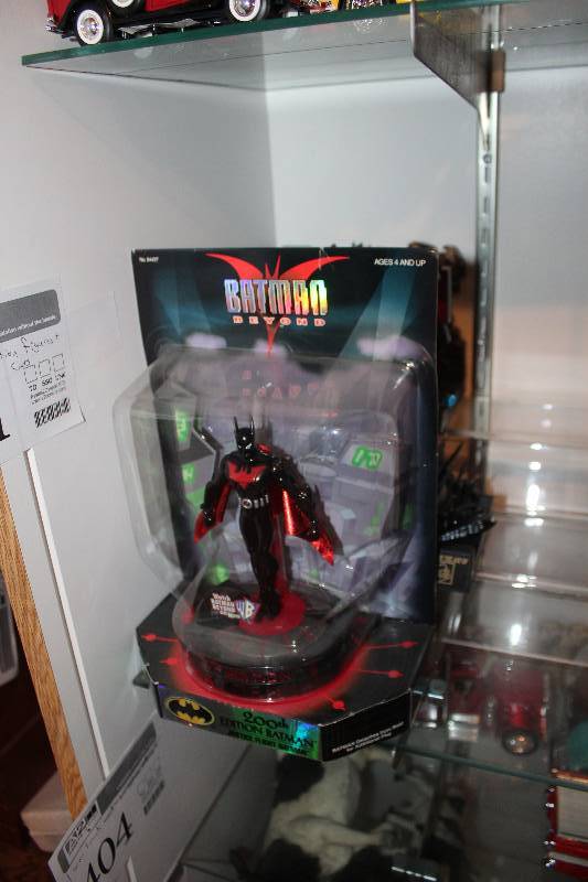 lot 401 image: Batman Action Figures, Toy Car
