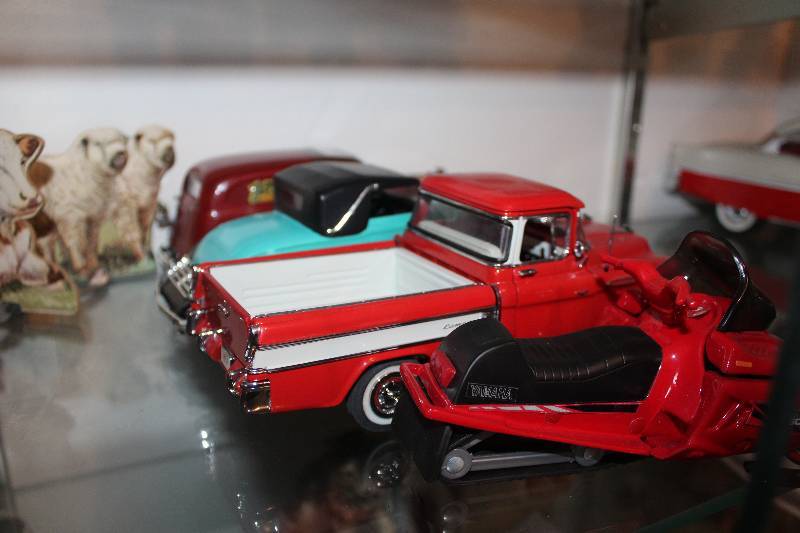 lot 405 image: Lot of (4) Collectible Toys - 3) Cars, 1) Snowmobile