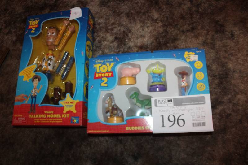 lot 196 image: Lot of (2) Toy Story 2 Action Figure, Stamper Sets