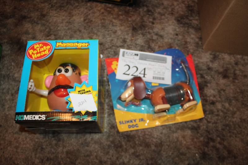 lot 224 image: Lot of (2) Toy Story Action Figures - Potato Head, Slinky Dog