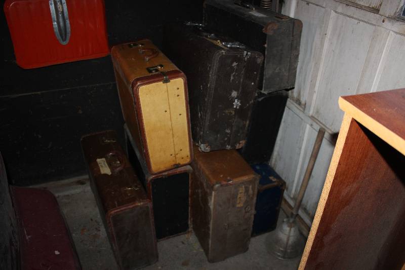 lot 1054 image: Lot of (8) Old Suitcases