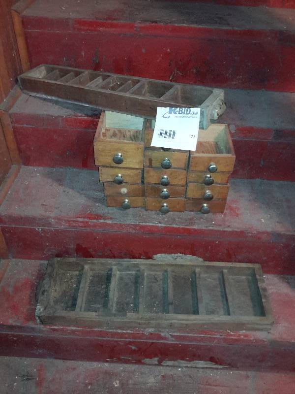 lot 77 image: Lot of small drawers plus a single long drawer.