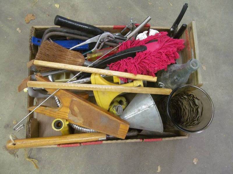 lot 58 image: tools, coke bottles, sprinklers