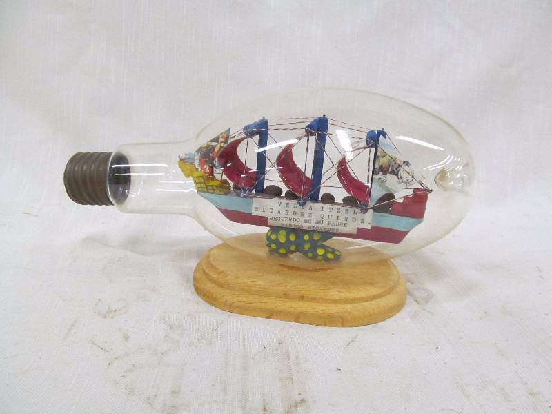 lot 91 image: ship in a light bulb