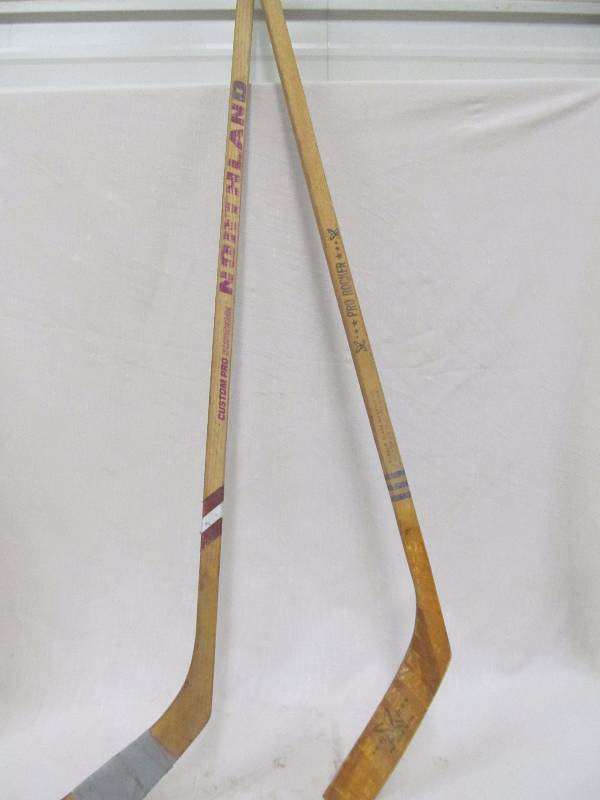 lot 128 image: vintage hockey sticks