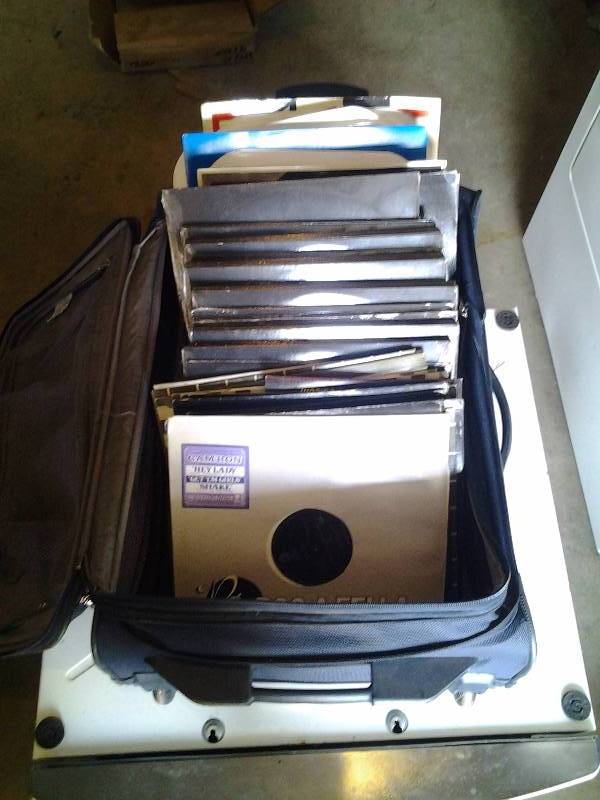 lot 8 image: Samsonite Rolling Suitcase FULL Of Record Albums