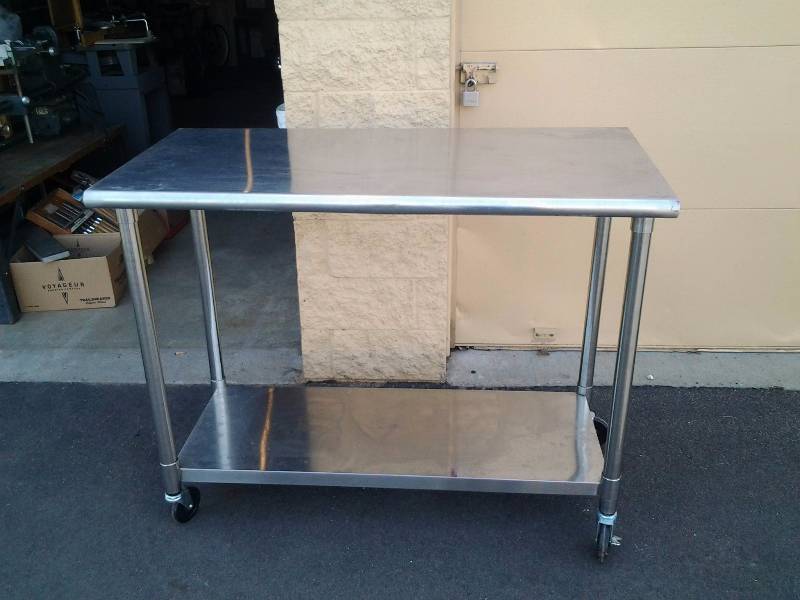 lot 14 image: Stainless Steel Rolling Table 48x24x38