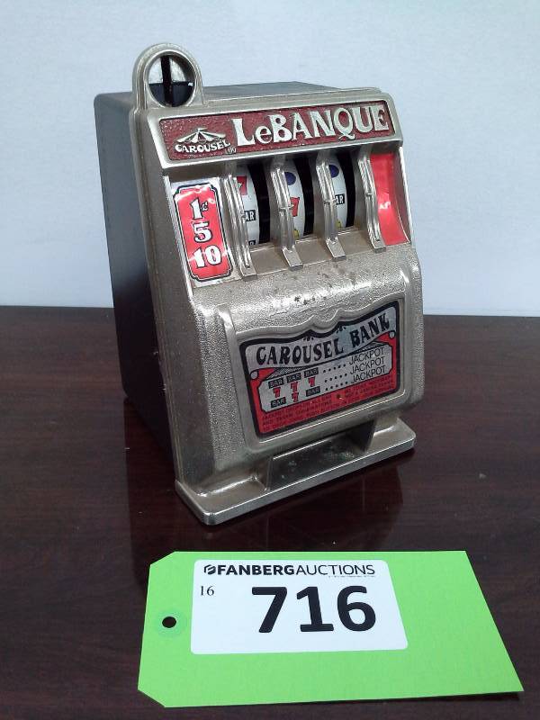 lot 716 image: Carousel LeBanque Coin Bank Slot Machine