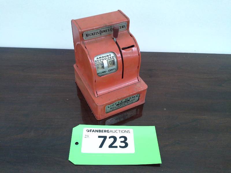 lot 723 image: Uncle Sams Register Coin Bank