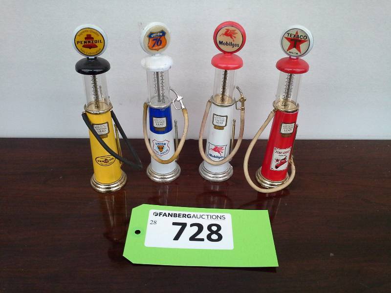 lot 728 image: Antique Gas Pump Miniature Replicas