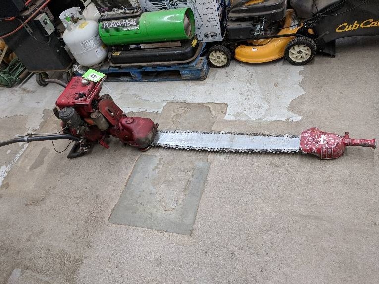 lot 498 image: Mall Antique Chain Saw