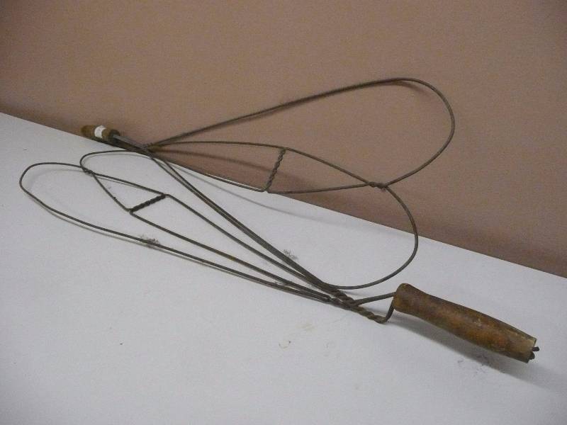 Sold at Auction: Vintage twisted wire rug beater