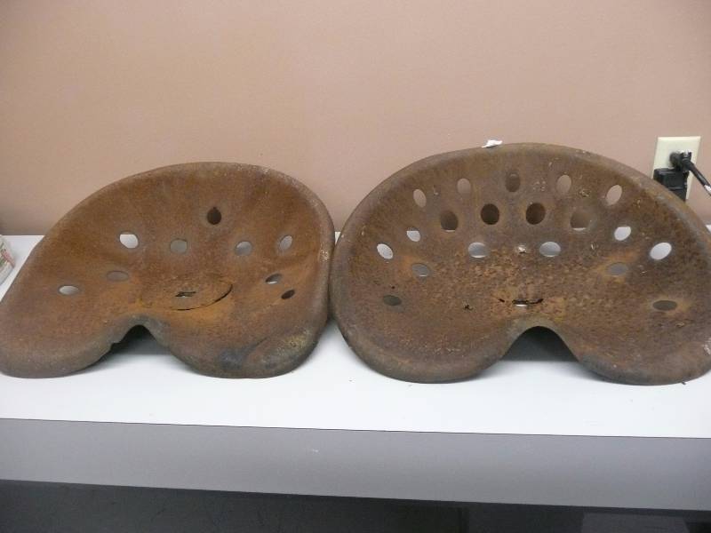 lot 47 image: 2 LARGE - ANTIQUEVINTAGE METAL TRACTOR SEATS - SEE PICTURES