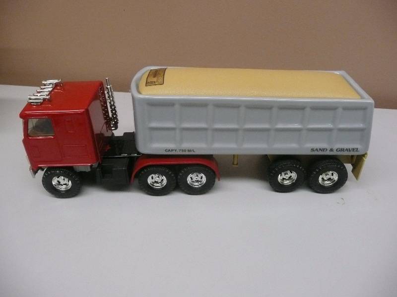 lot 67 image: JIM BEAM Vintage  - DUMP TRUCK - LIKE NEWNEVER OUT OF THE BOX - SEE PICTURES