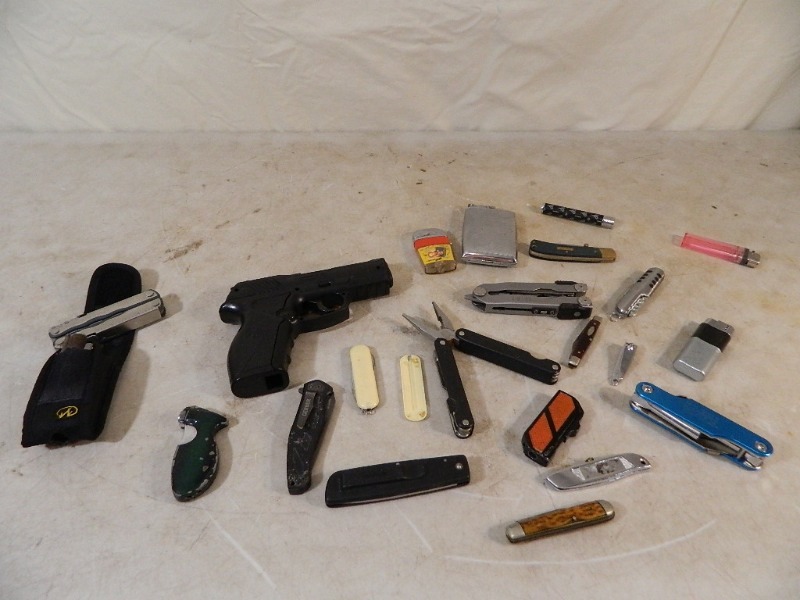 lot 16 image: Leatherman, BB Gun, More