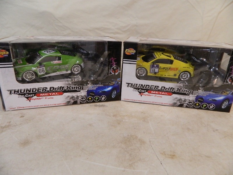 lot 38 image: 2 New Metal Thunder Drift King RC Cars