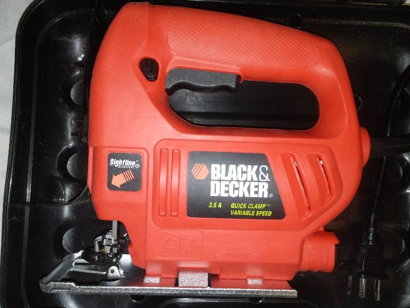 lot 18 image: Black and Decker Quick Clamp Variable Speed Jigsaw, New in Case