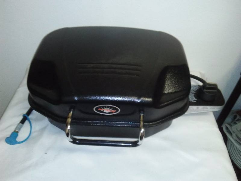 lot 38 image: Flame King Tabletop Propane Grill with storage case