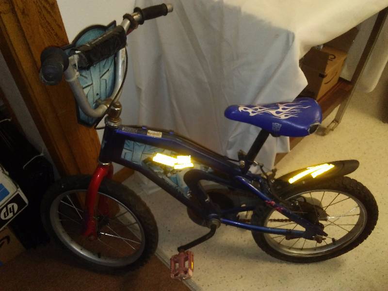lot 41 image: Boys Racing Dirt Bike, Optimus Prime