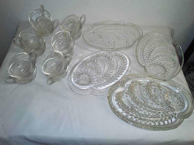 lot 74 image: Prescut Mermaid Tail Cups (12)Federal Glass Luncheon Plates (6) ,Add elegance to your Christmas Egg Nog with