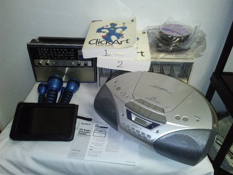 lot 81 image: Misc. Electronic, Kindle (not tested), Flashlights (3) Sony Compact Stereo, GE Transistor  See Pictures